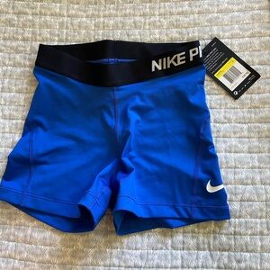 Nike Dri-Fit athletic shorts. Size S, tags still on.